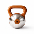 A kettlebell with a polished stainless steel body and a curved wooden handle